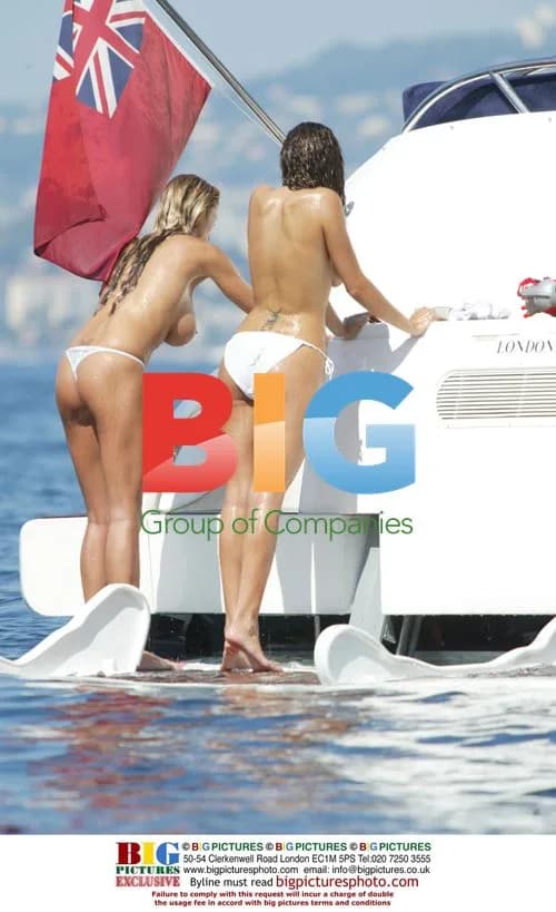 Models Enjoy Playful Waterfight on Yacht