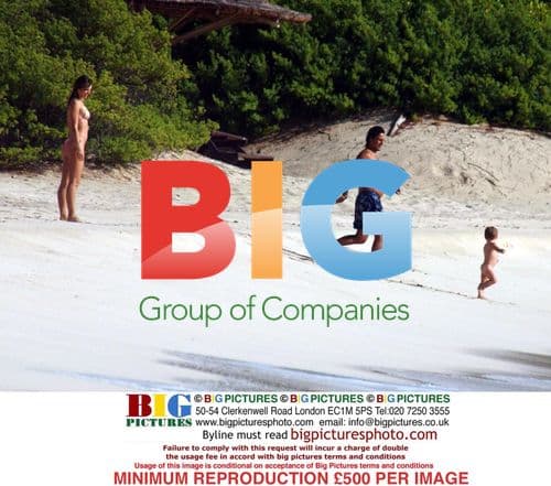 Elizabeth Hurley Relaxing on Caribbean Beach