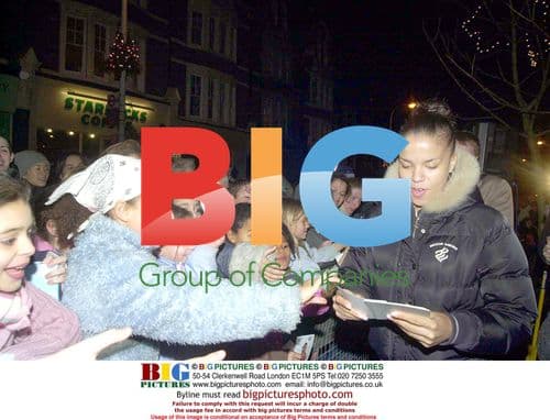 Ms. Dynamite Switches on Christmas Lights