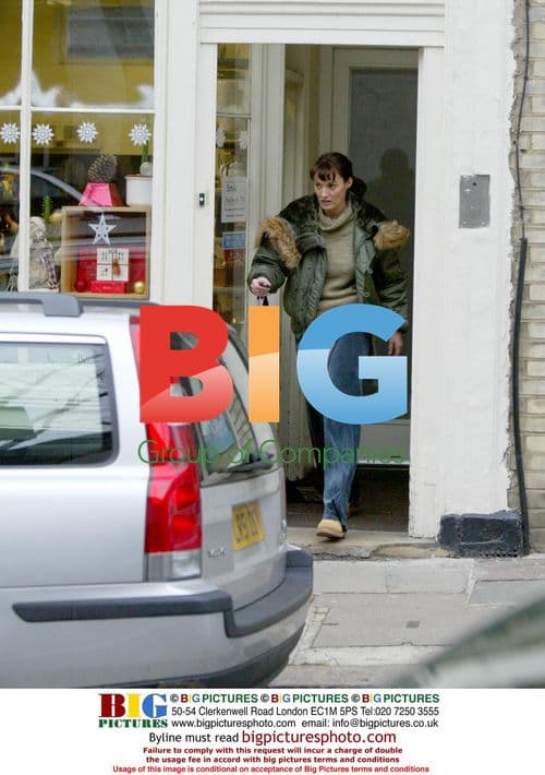 Sarah Parish takes donations to Oxfam