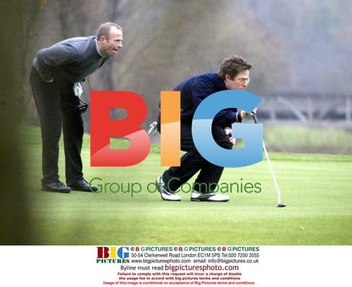 Hugh Grant Playing Golf