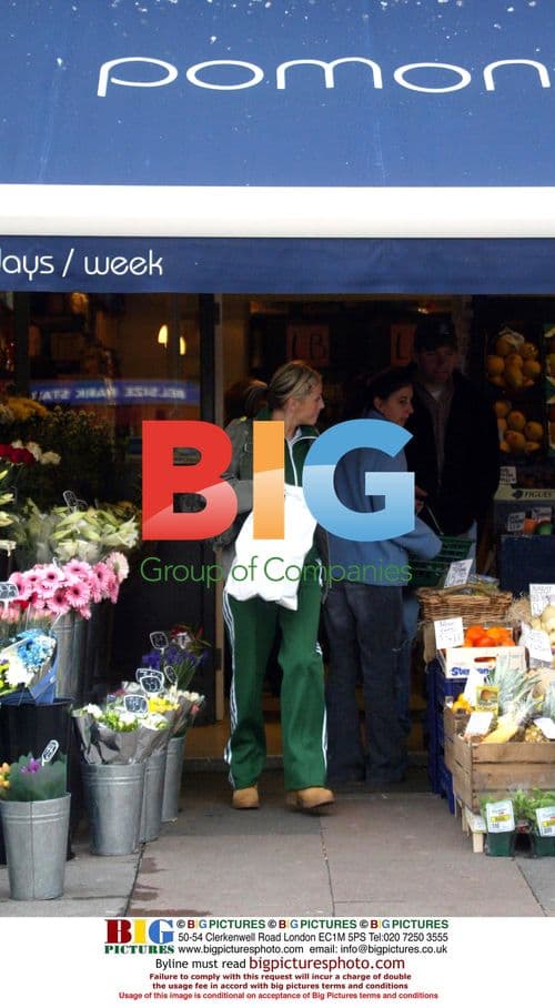 Keanu Reeves smiling on red carpet