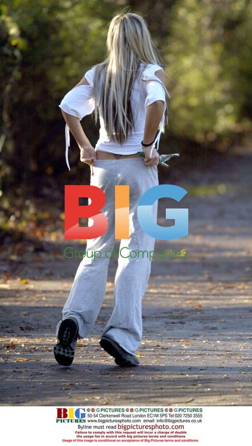 Glamour model Ebony exercises in London park