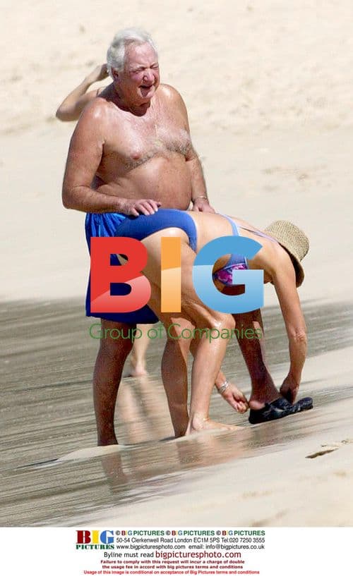 Michael Winner Relaxes on Caribbean Beach