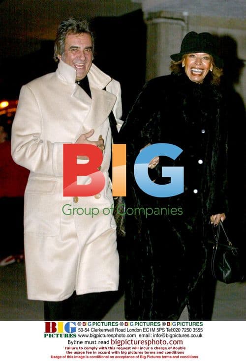 David Dickinson and wife stroll in Knightsbridge