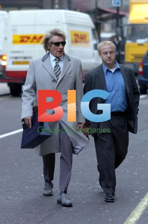Rod Stewart and companion after shopping