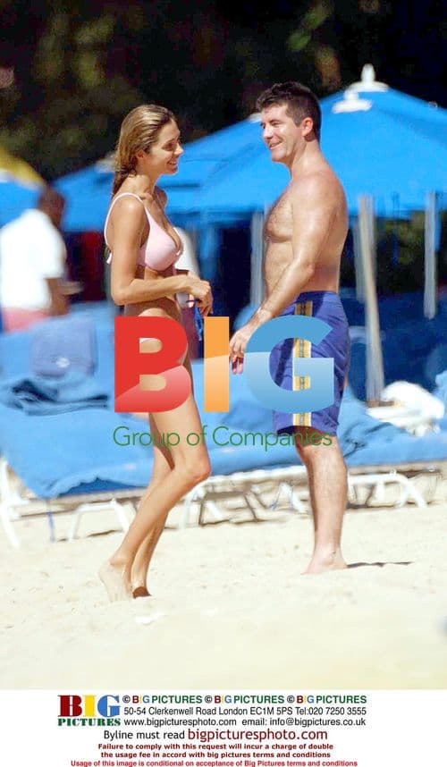 Simon Cowell chats on Caribbean beach with girlfriend