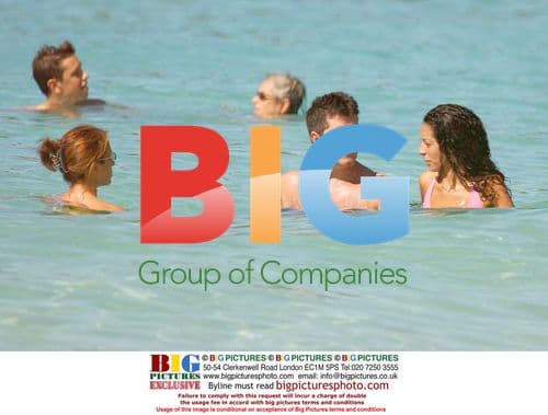 Simon Cowell with Terri and friends on Caribbean beach