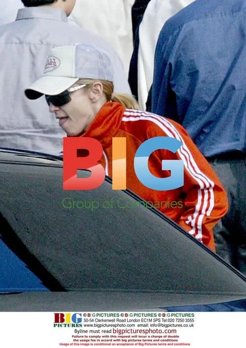 Madonna wears red adidas tracksuit in Beverly Hills