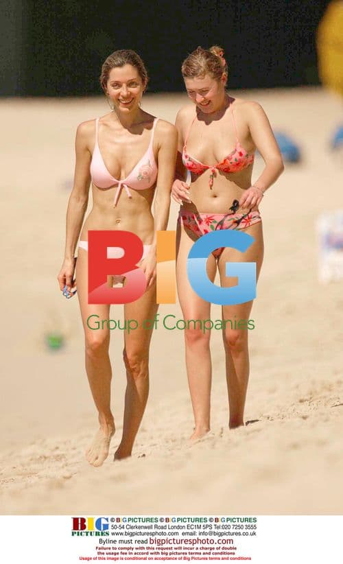 Simon Cowell Chats with Blonde on Caribbean Beach