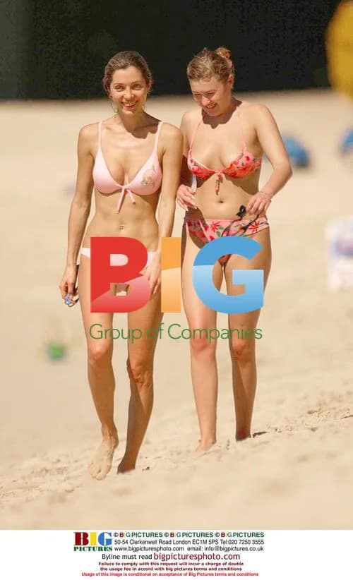 Simon Cowell Chats with Blonde on Caribbean Beach
