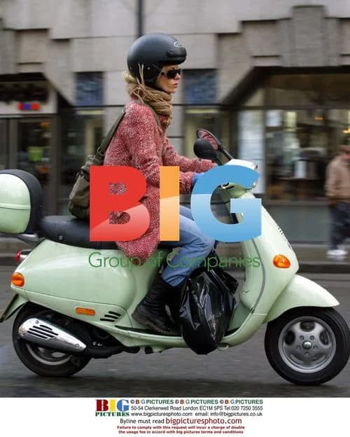 Laura Bailey Rides Vespa in London
