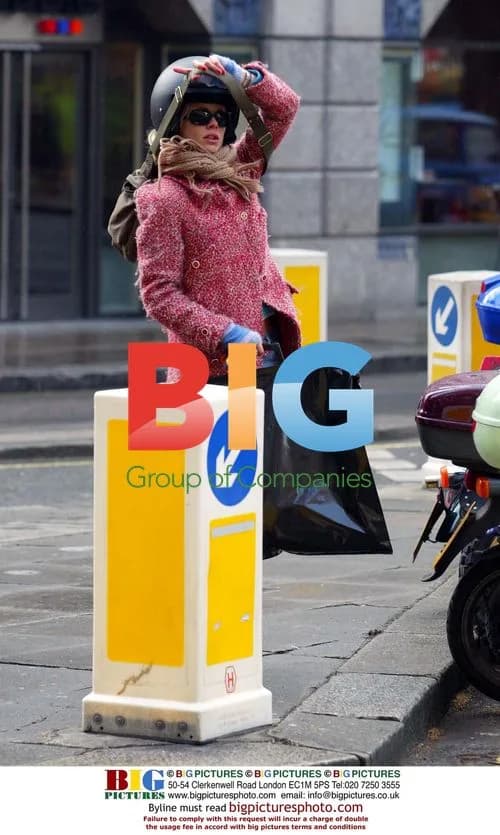 Model Laura Bailey on Vespa in London