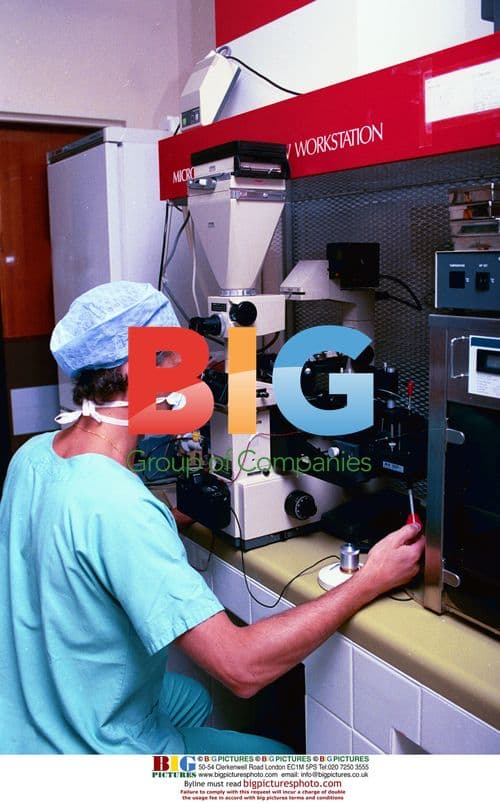 Doctor examines newborn baby