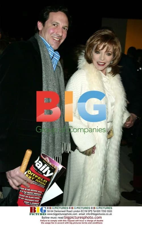 Joan Collins at Oscar De La Renta Fashion Show