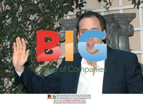 Nicholas Cage Poses After Press Conference