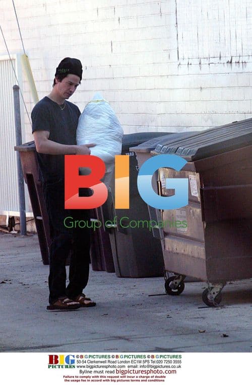 Keanu Reeves takes box to home