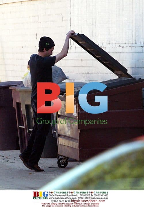 Keanu Reeves Takes Out Trash