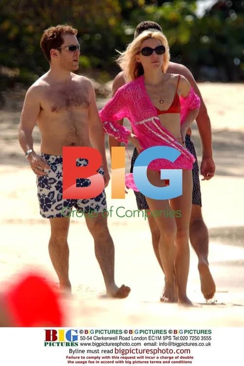 Tom Hollander on beach in Barbados