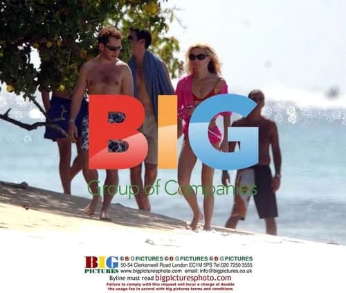 Tom Hollander on beach in Barbados
