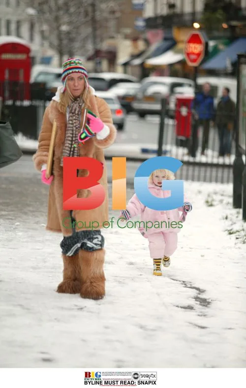 Meg Matthews and daughter Anais play in snow
