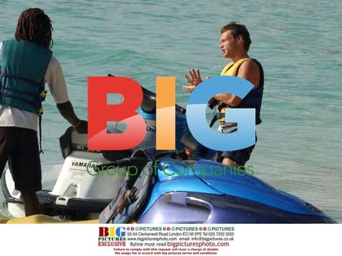 Ryan Seacrest and Simon Cowell Race Jet Skis