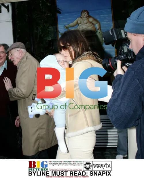 Liz Hurley, sister, and baby Damien leave restaurant