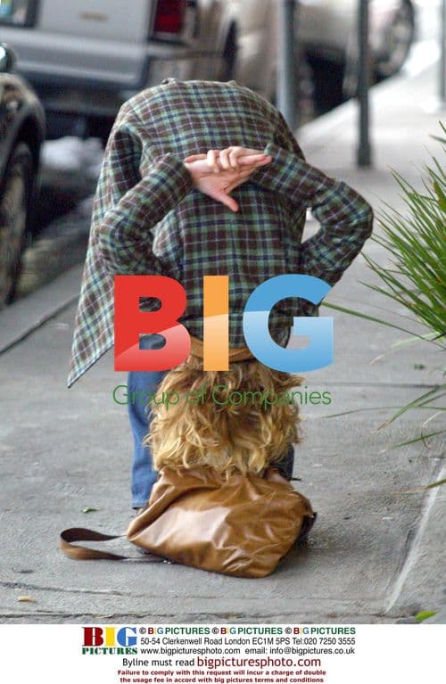 Meg Ryan stretches after facial in Beverly Hills