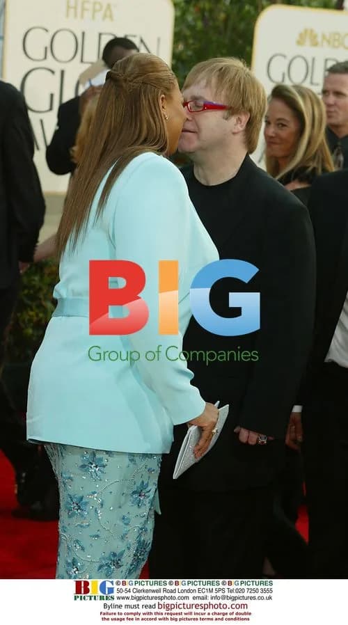 Queen Latifah, Elton John, and David Furnish at Golden Globes