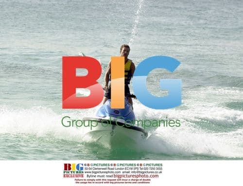 Ryan Seacrest and Simon Cowell Race Jet Skis