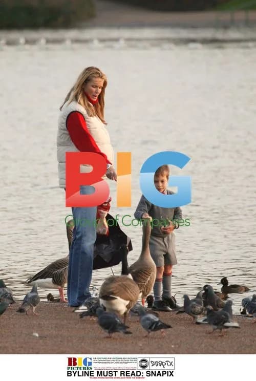 Elle McPherson and Son Feeding Ducks