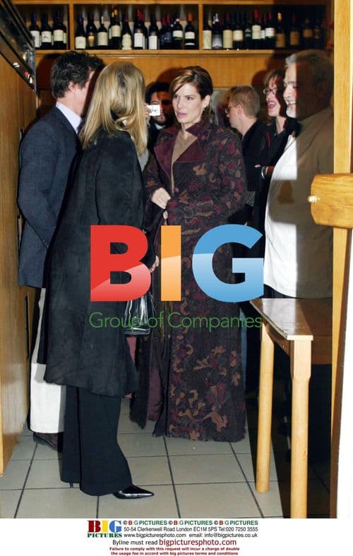 Hugh Grant and Sandra Bullock at "Il Matriciano" in Rome