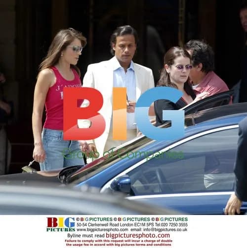 Liz Hurley and boyfriend Arun Nayar leaving the Ritz in Paris