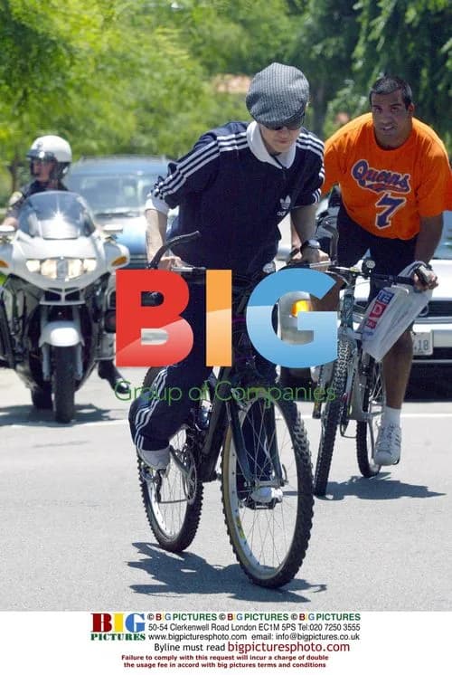Madonna riding bike, signs autograph