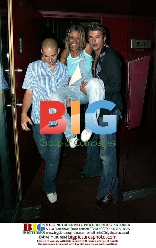 Jodie Marsh carried by brother from club