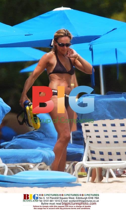 Carol Smilie and kids play in Barbados sea