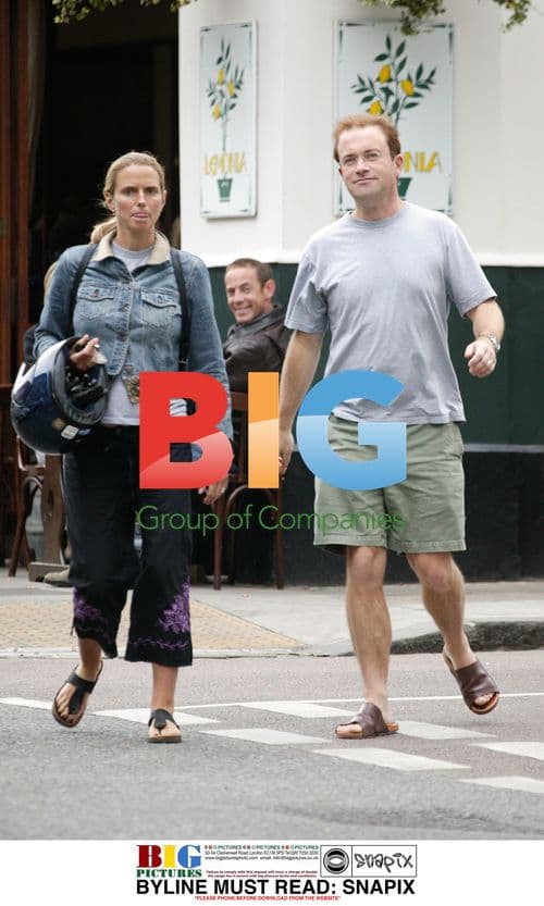 Harry Enfield out walking with wife in Primrose Hill