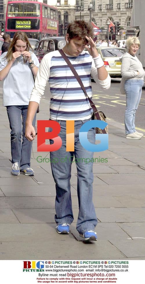 Brian Dowling Appears Annoyed in London