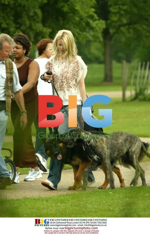 Claudia Schiffer Walks Dog in London Park