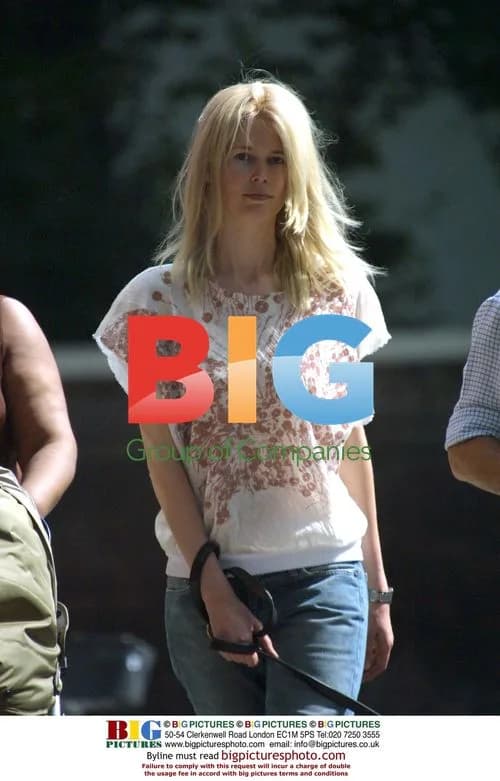 Claudia Schiffer Walks Dog in London Park