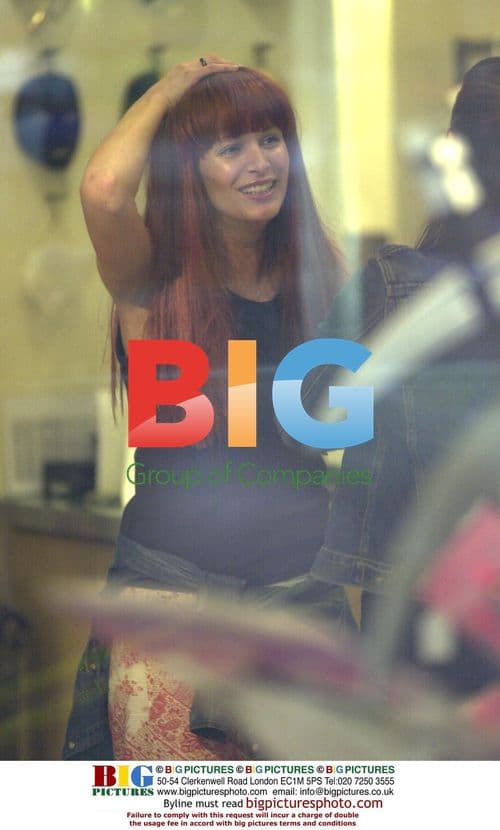 Model Catalina Tries on Wigs in London