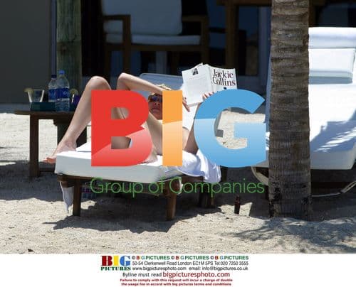 Jemma Kidd sunbathing in Mauritius