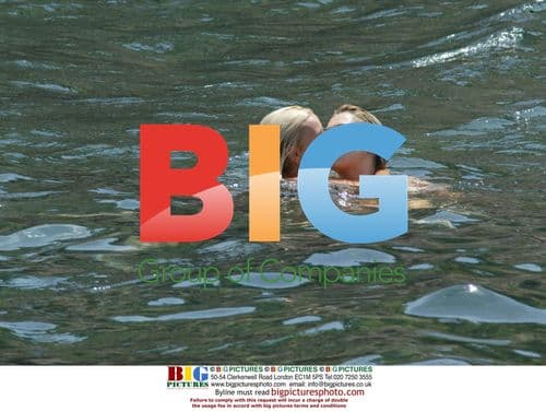 Playboy TV presenter Hayley Finch and model Emily Dean frolic in the sun