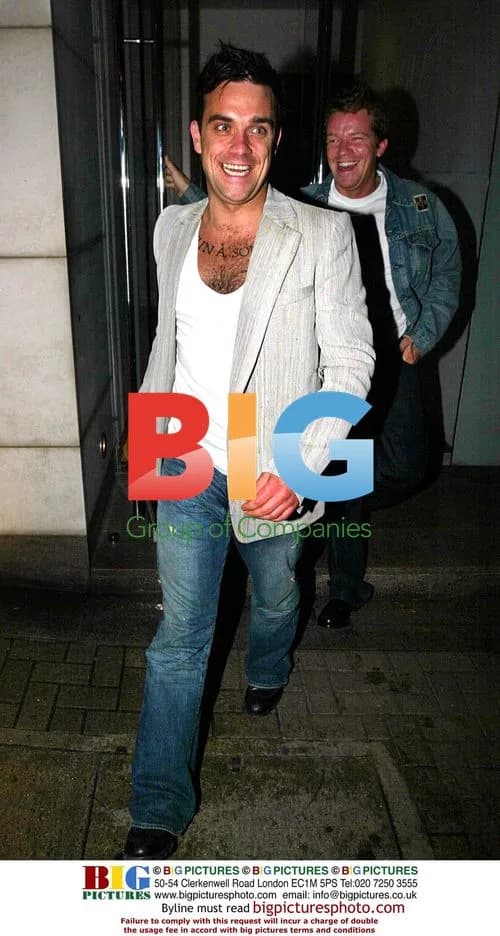 Robbie Williams Laughing After Dinner