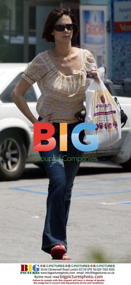 Catherine Bell shows baby Gemma in Malibu