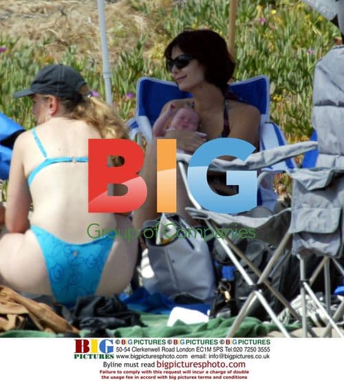 Catherine Bell shows off baby Gemma in Malibu