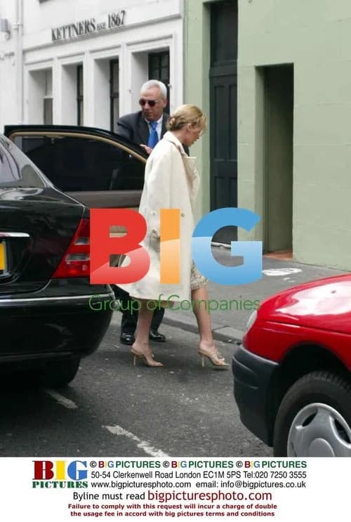 Kylie Minogue leaving London home