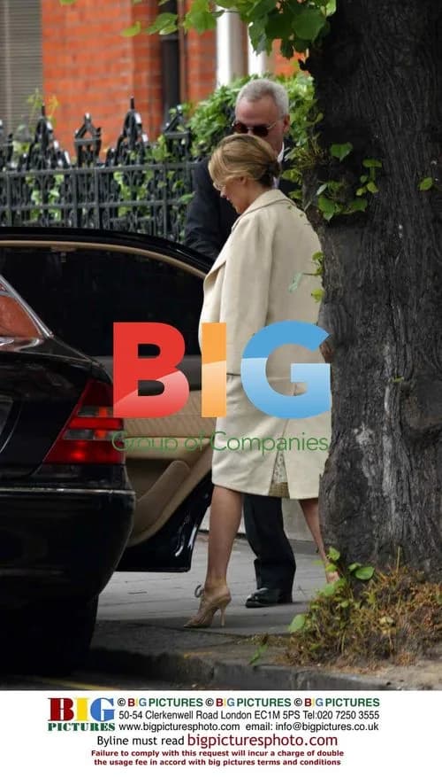 Kylie Minogue leaves London home