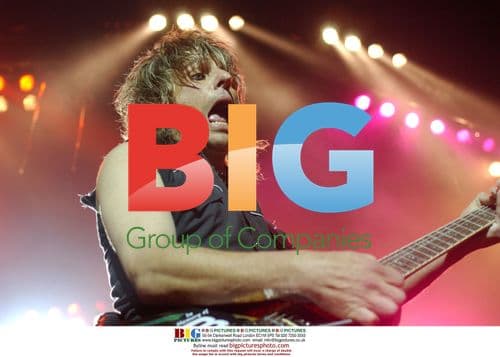 Poison guitarist CC DeMILLE performs