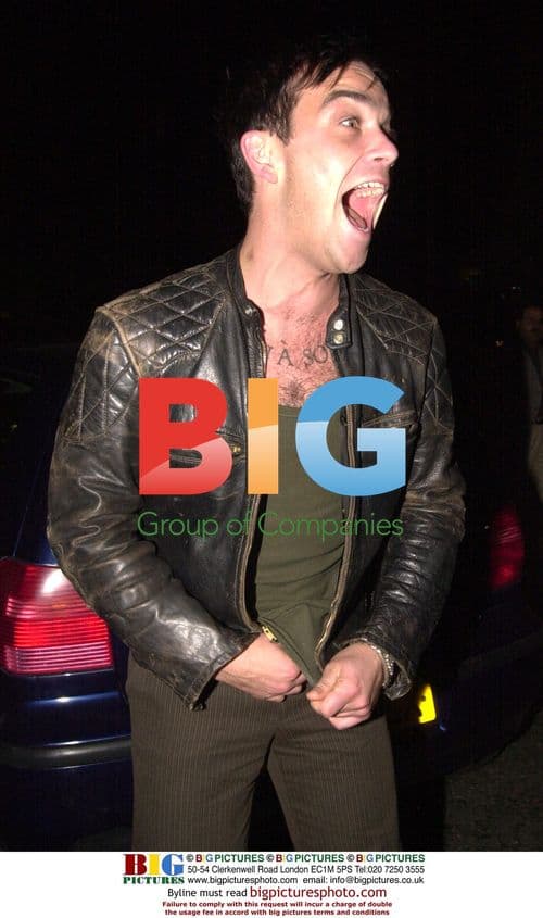 Robbie Williams Leaves Nobu with Celebrities